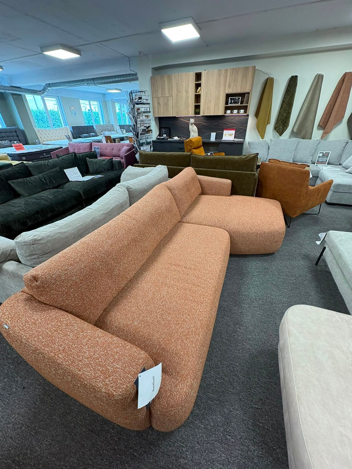 Bellus Cedar rounded sofa with a retro-inspired design, comfortable seating and an elegant appearance.