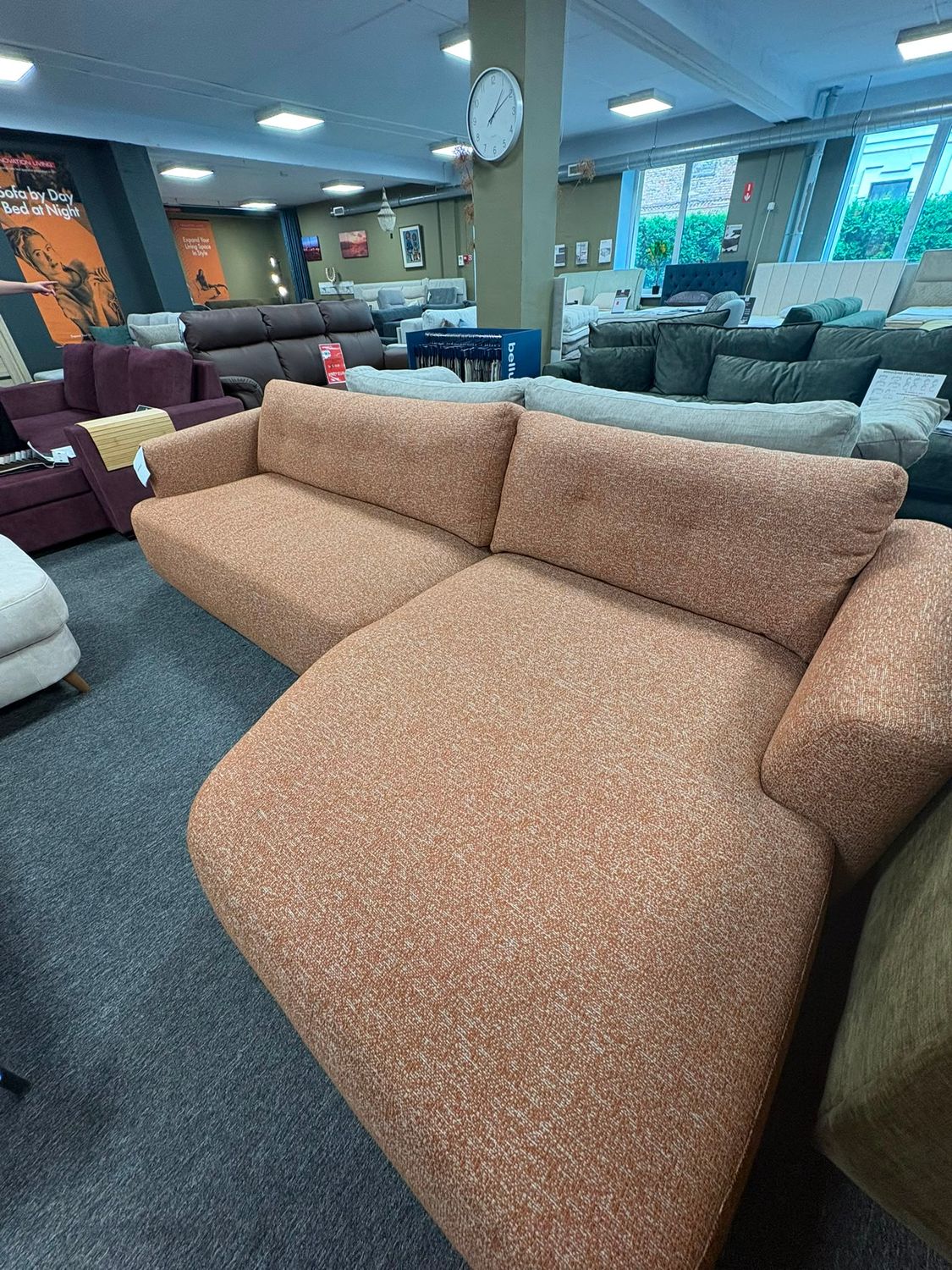 Bellus Cedar rounded sofa with a retro-inspired design, comfortable seating and an elegant appearance.