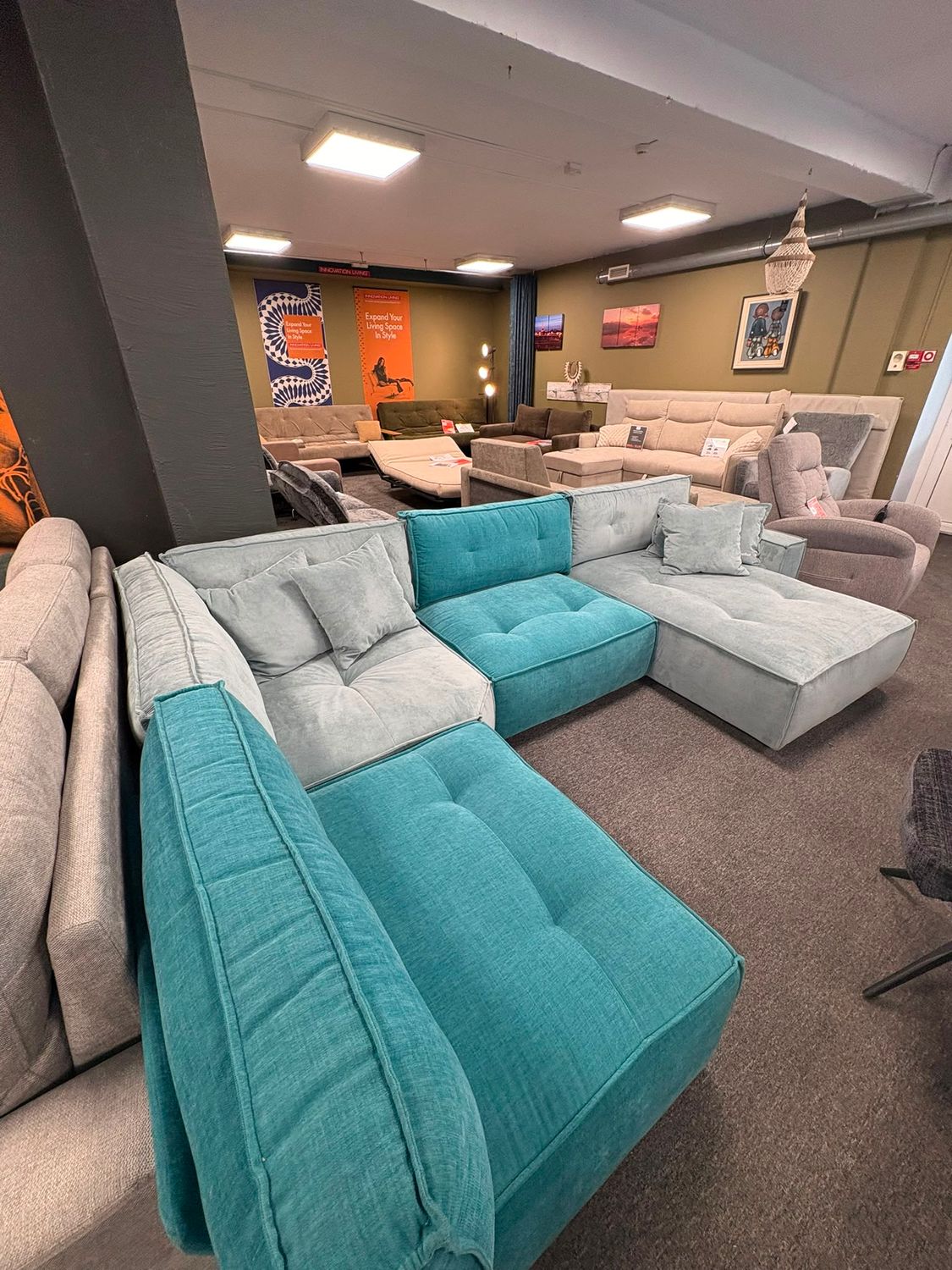 Bellus Levi modular sofa display model with 7+ configurations and Cloud System comfort system.