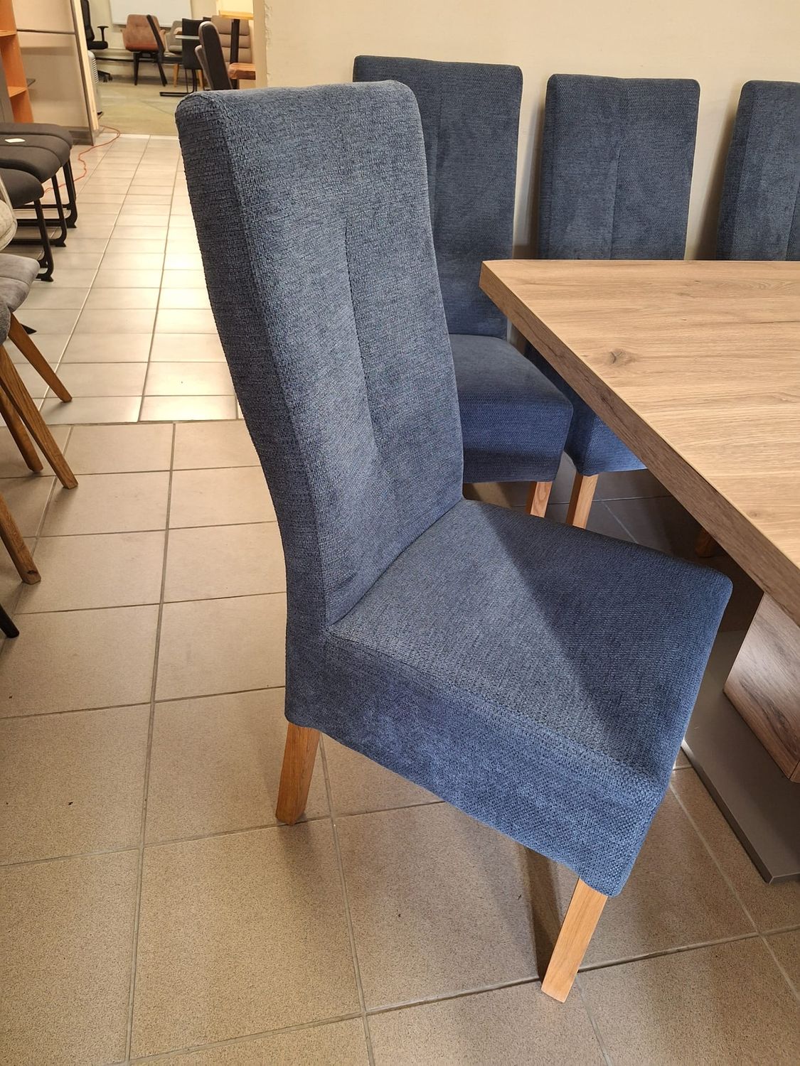 Blue chairs with high backs and armrests. Depth: 63 cm
Width: 44 cm
Height: 103 cm
Seat depth: 42 cm, width: 44 cm
