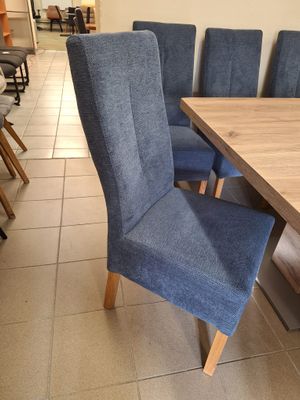Blue chairs with high backs and armrests. Depth: 63 cm
Width: 44 cm
Height: 103 cm
Seat depth: 42 cm, width: 44 cm
