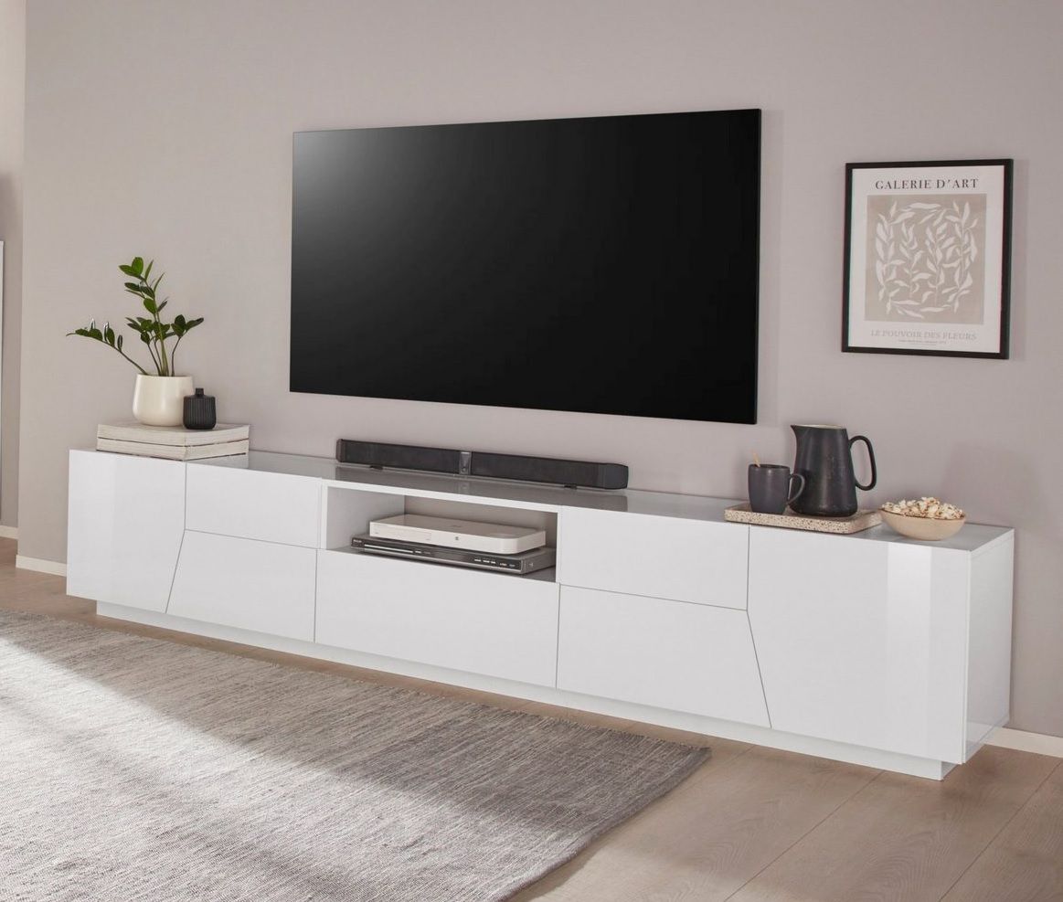 TV12 TV cabinet with a glossy white finish, 220 cm wide, 46 cm high and 43 cm deep.