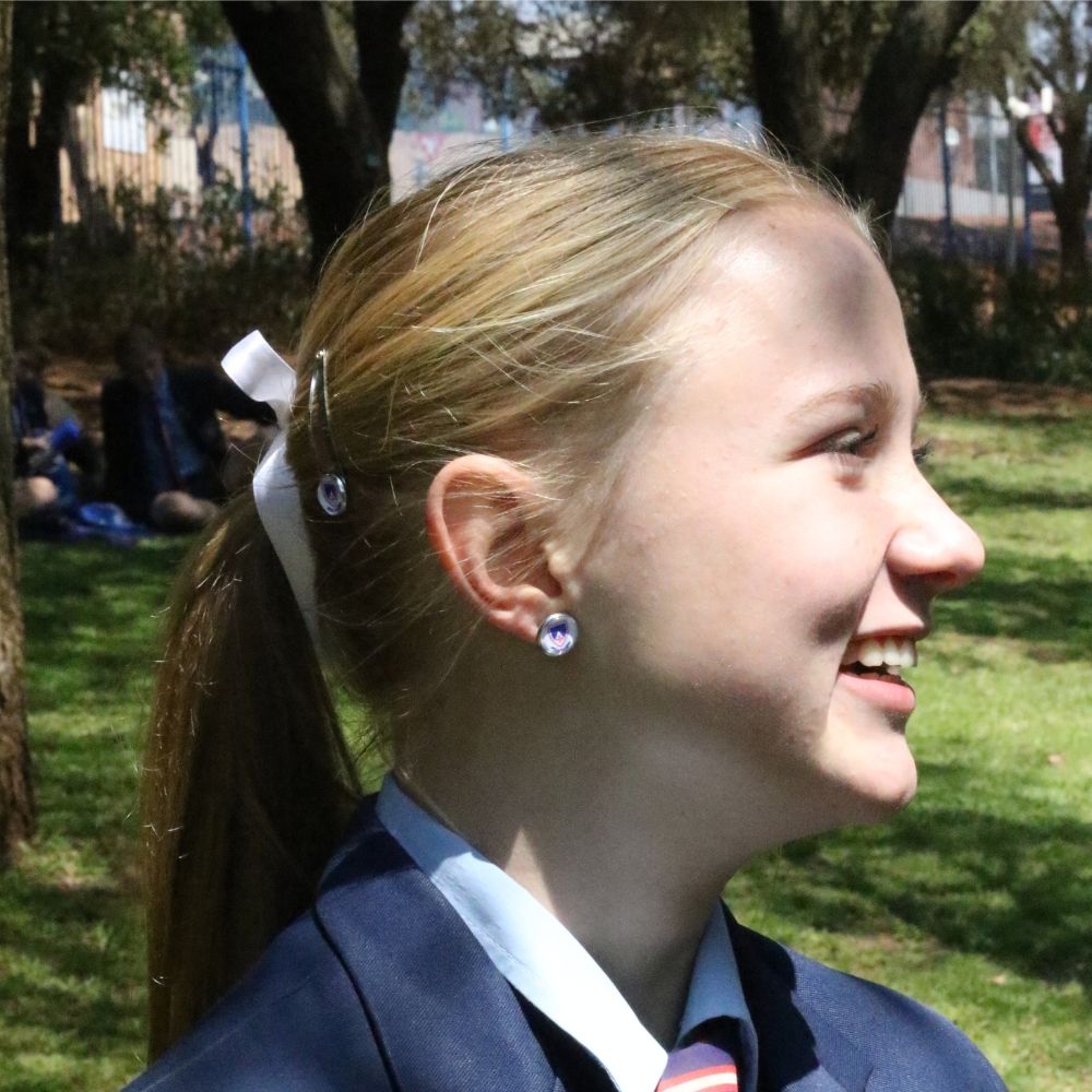 Oorbelle met skoolwapen