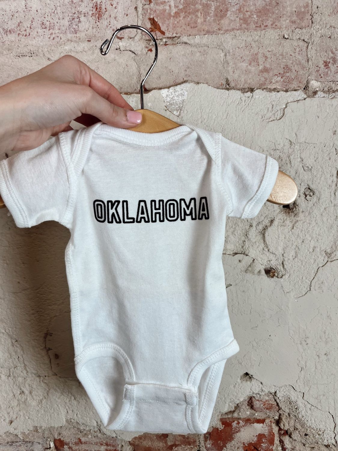 OK OUTLINE ONESIE WHITE