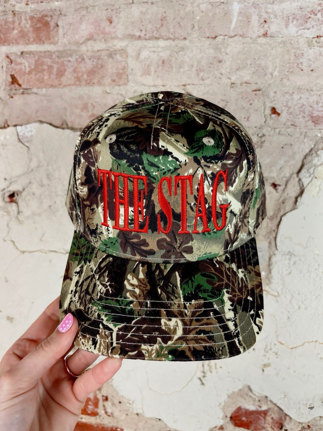 THE STAG CAMO TRUCKER