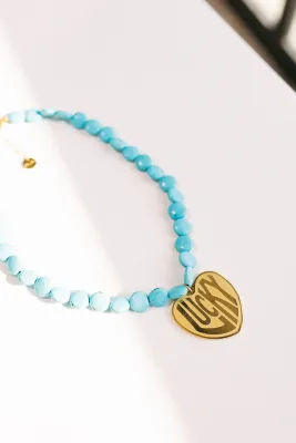 LUCKY IN LOVE BLUE HEART NECKLACE THE STAG ARDMORE OKLAHOMA