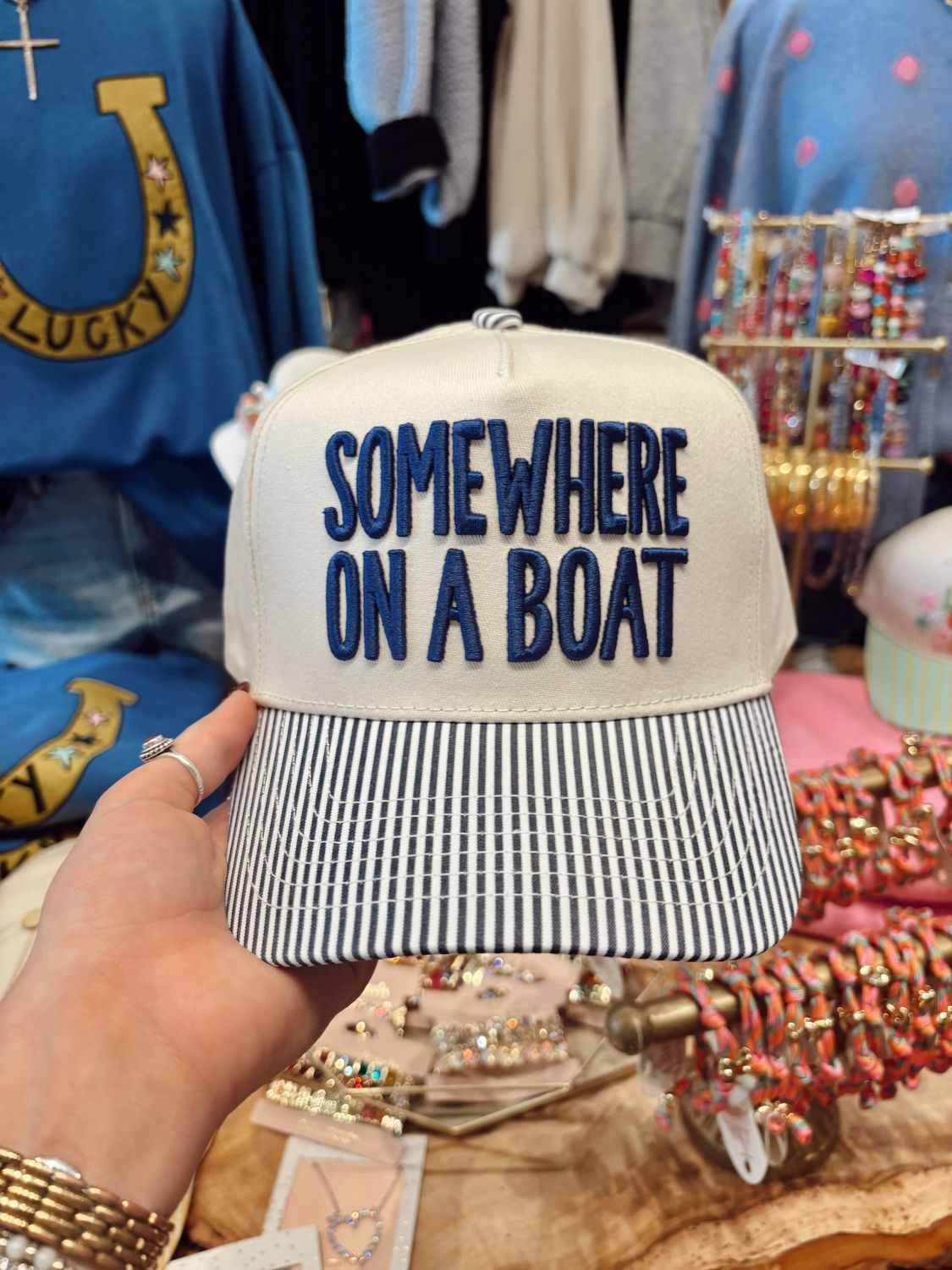 SOMEWHERE ON A BOAT TRUCKER