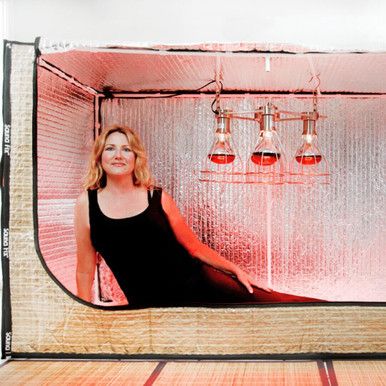 Sauna-Fix-and-radiant-tent,-with-travel-bags-and-bamboo-mats.