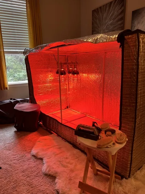 Sauna Fix portable near infrared lamp and tent in the lay down position