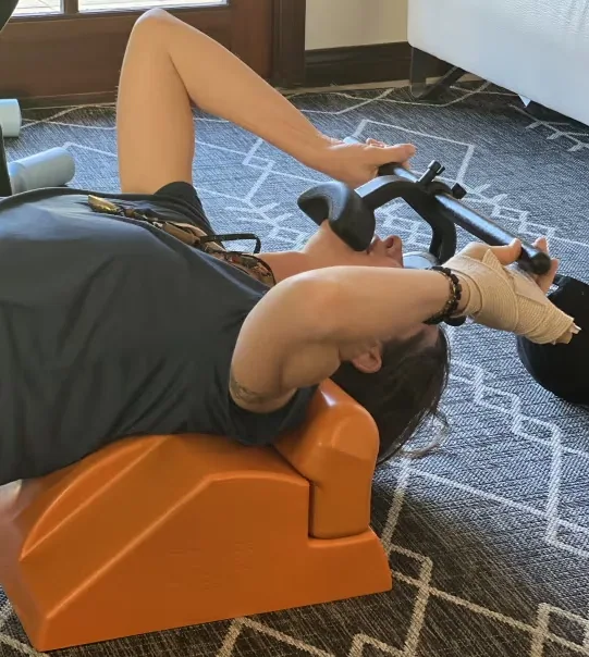 Neck Shaper being used while lying on a Power Cushion