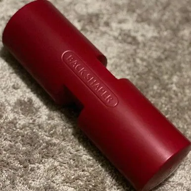 Hard density maroon foam roller for low back