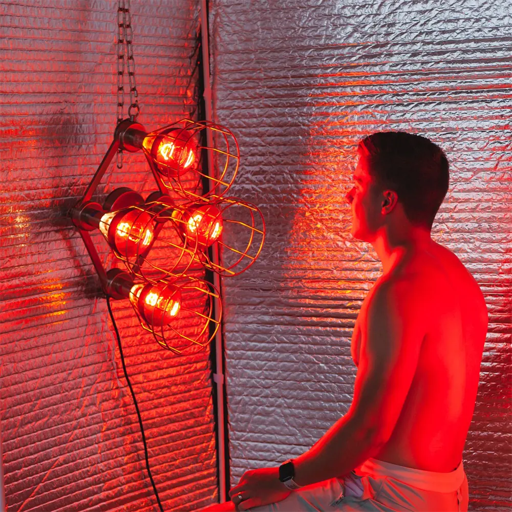 Glowing near infrared sauna bulbs delivering radiant heat