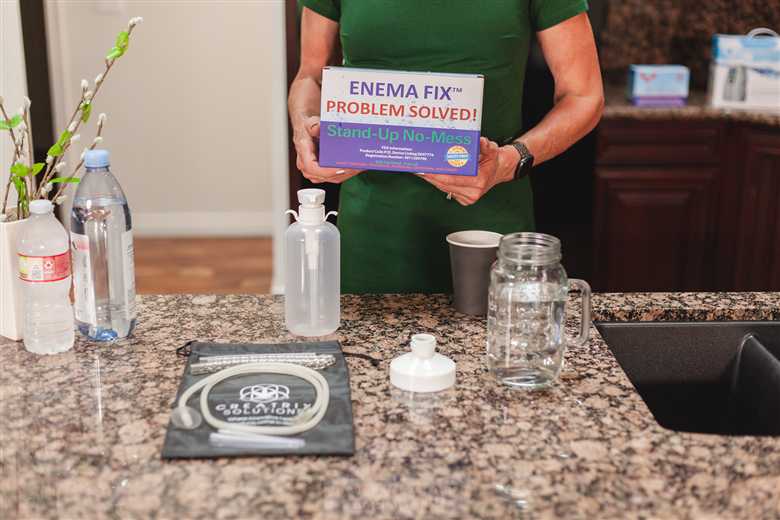 The Enema Fix Stand-Up No-Mess kit with box and components on the counter
