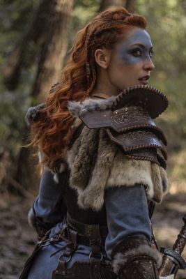 Viking fantasy style leather shoulder pad for larp and cosplay. Barbarian model
