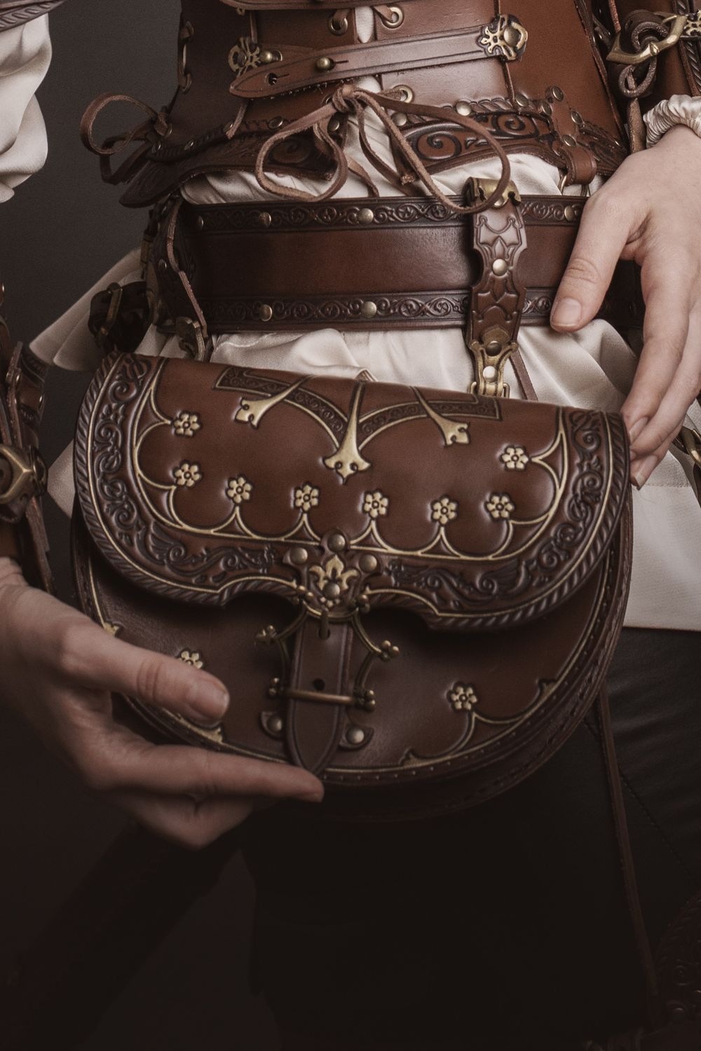 Alastor leather bag with shoulder strap and belt holders. Matching card holder available.