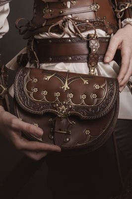 Alastor leather bag with shoulder strap and belt holders. Matching card holder available.