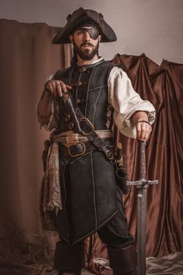 Long black leather vest
