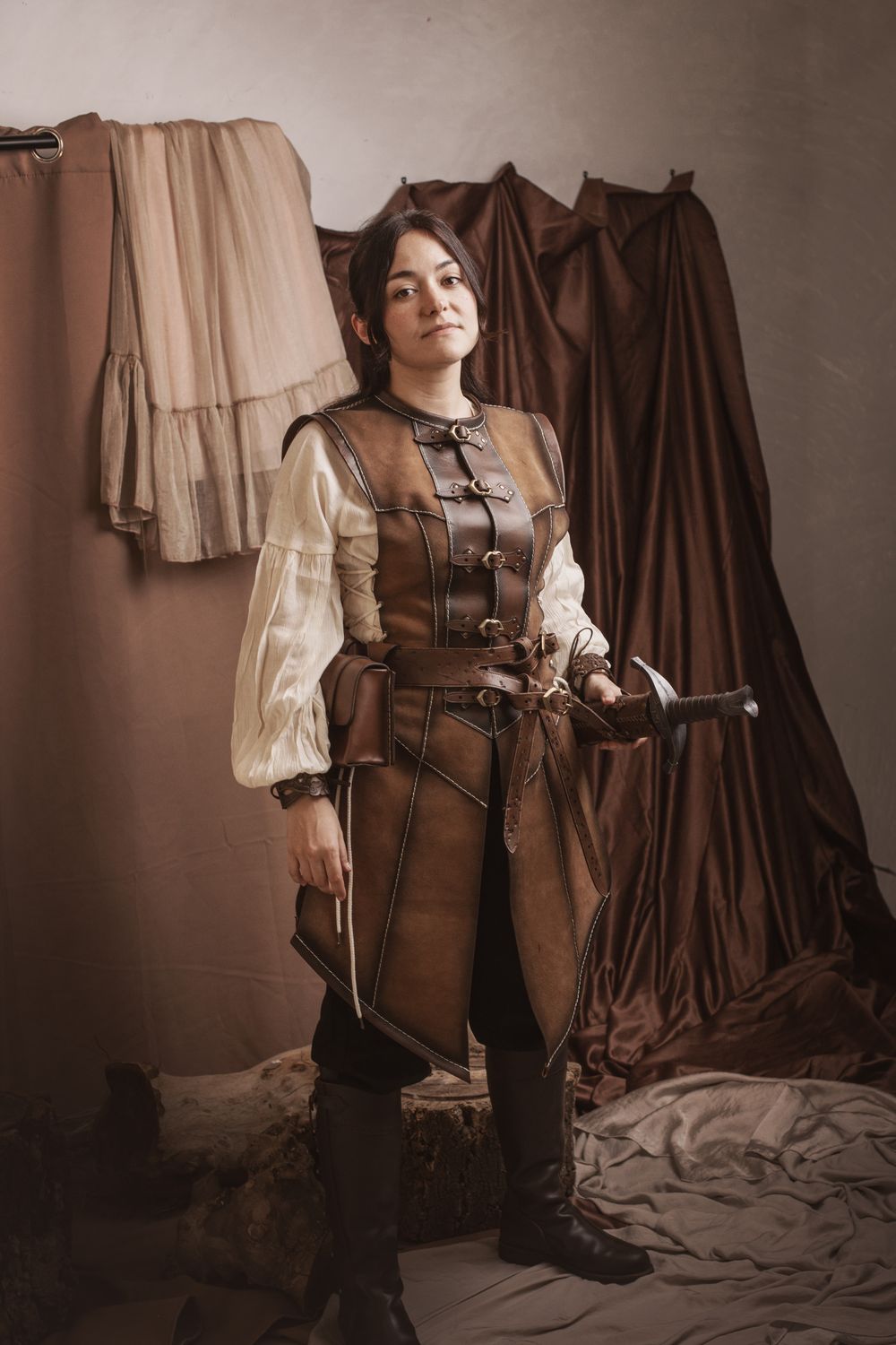 Long brown leather vest