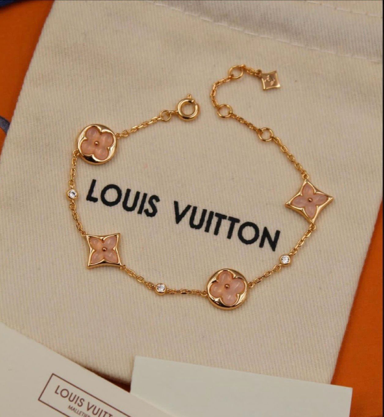 LV GOLD PINK PEARL EFFECT BRACELET 