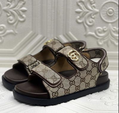 Gucci slip on sandals w/ back strap 
