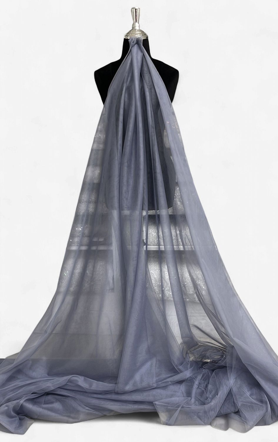 300CM LUX SPARKLE TULLE -(per m)-300-56-SILVER-A fine, lightweight netting fabric embellished with subtle glitter or metallic sparkle fibers.