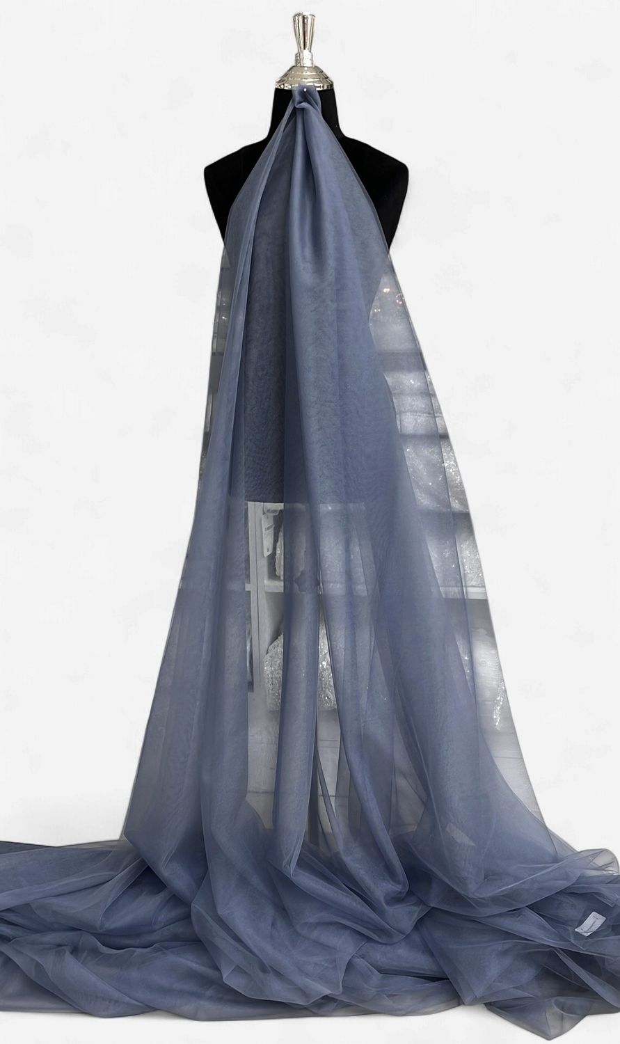 300CM LUX SPARKLE TULLE -(per m)-300-55-GREY-A fine, lightweight netting fabric embellished with subtle glitter or metallic sparkle fibers.