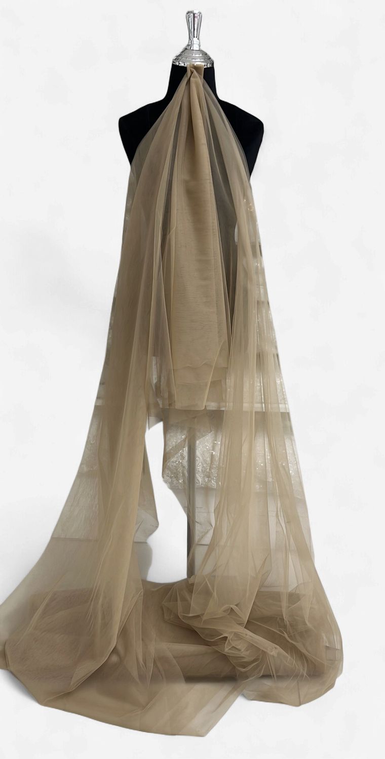 300CM LUX SPARKLE TULLE -(per m)-300-09-MINK-A fine, lightweight netting fabric embellished with subtle glitter or metallic sparkle fibers.