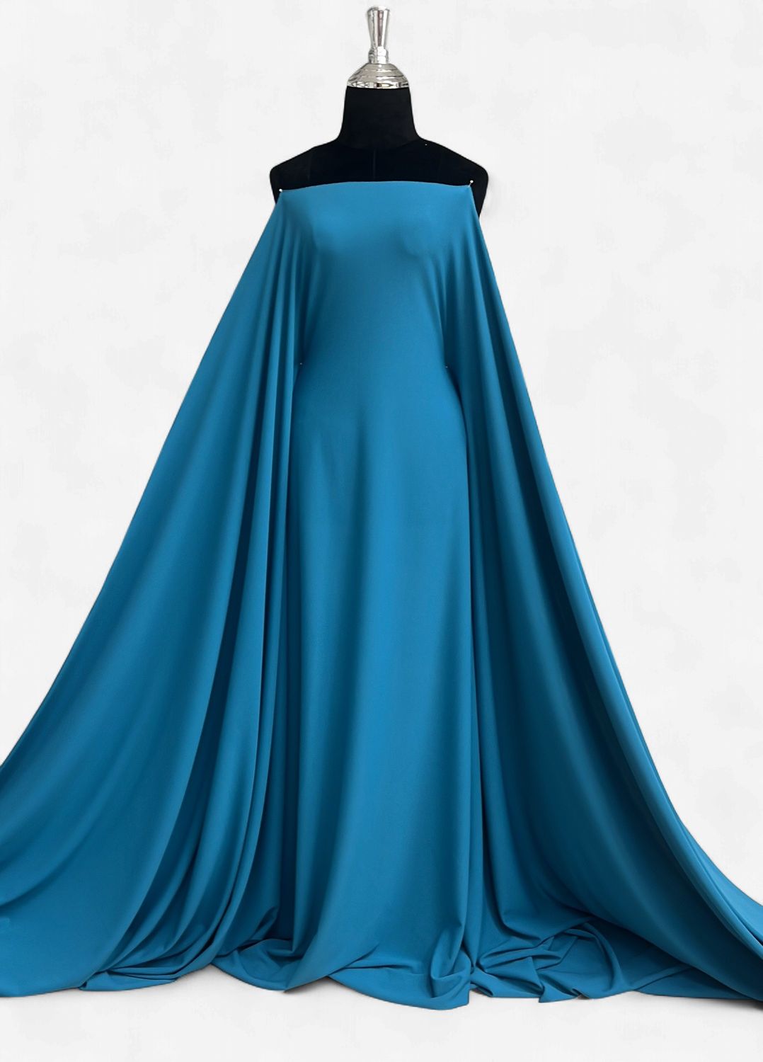 SCUBA CREPE-(per m)-150-12-TURQ-A double-knit fabric with a smooth, spongy interior and a textured crepe exterior.