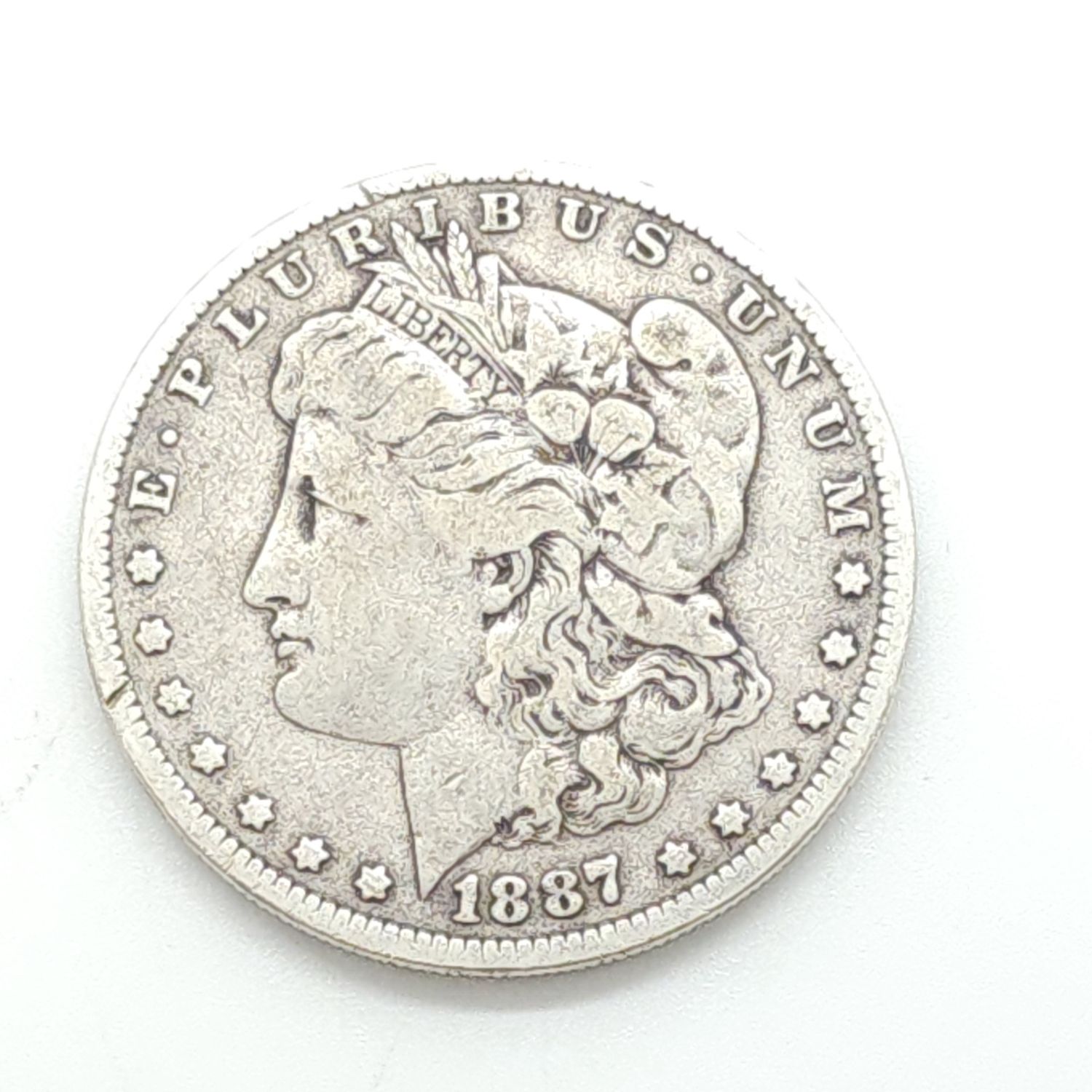 1887 Morgan Silver Dollar.