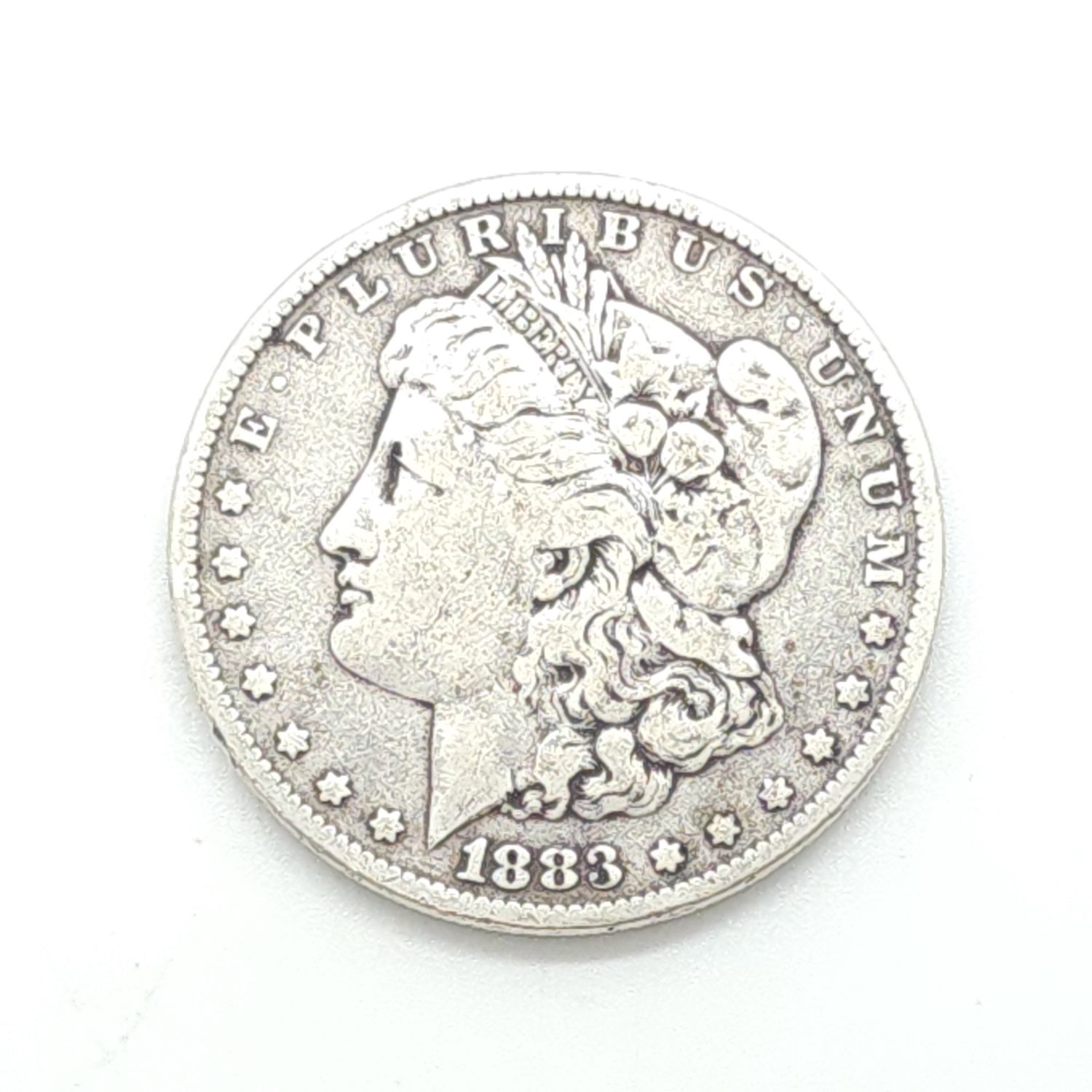 1883 Morgan Silver Dollar.