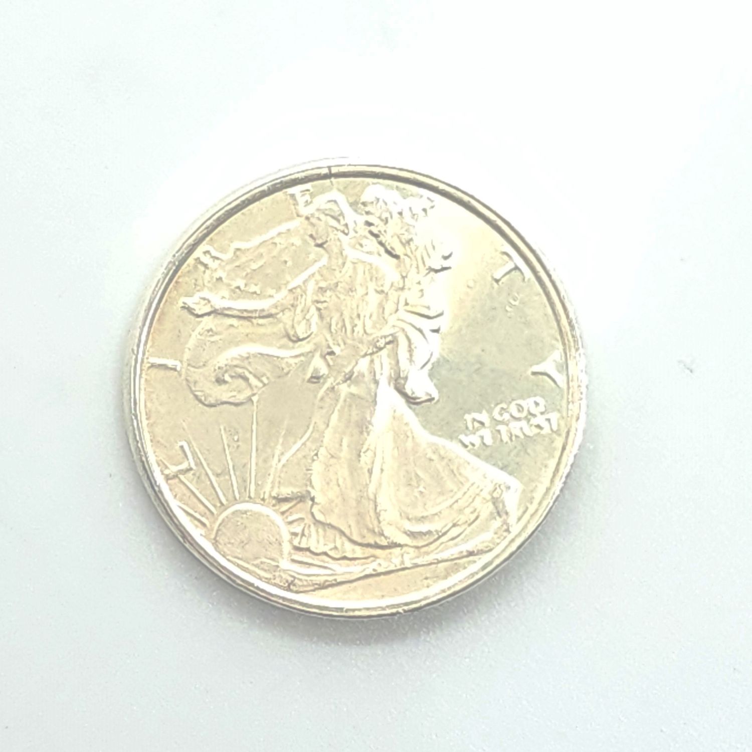 1/4 oz Walking Liberty Silver Round.