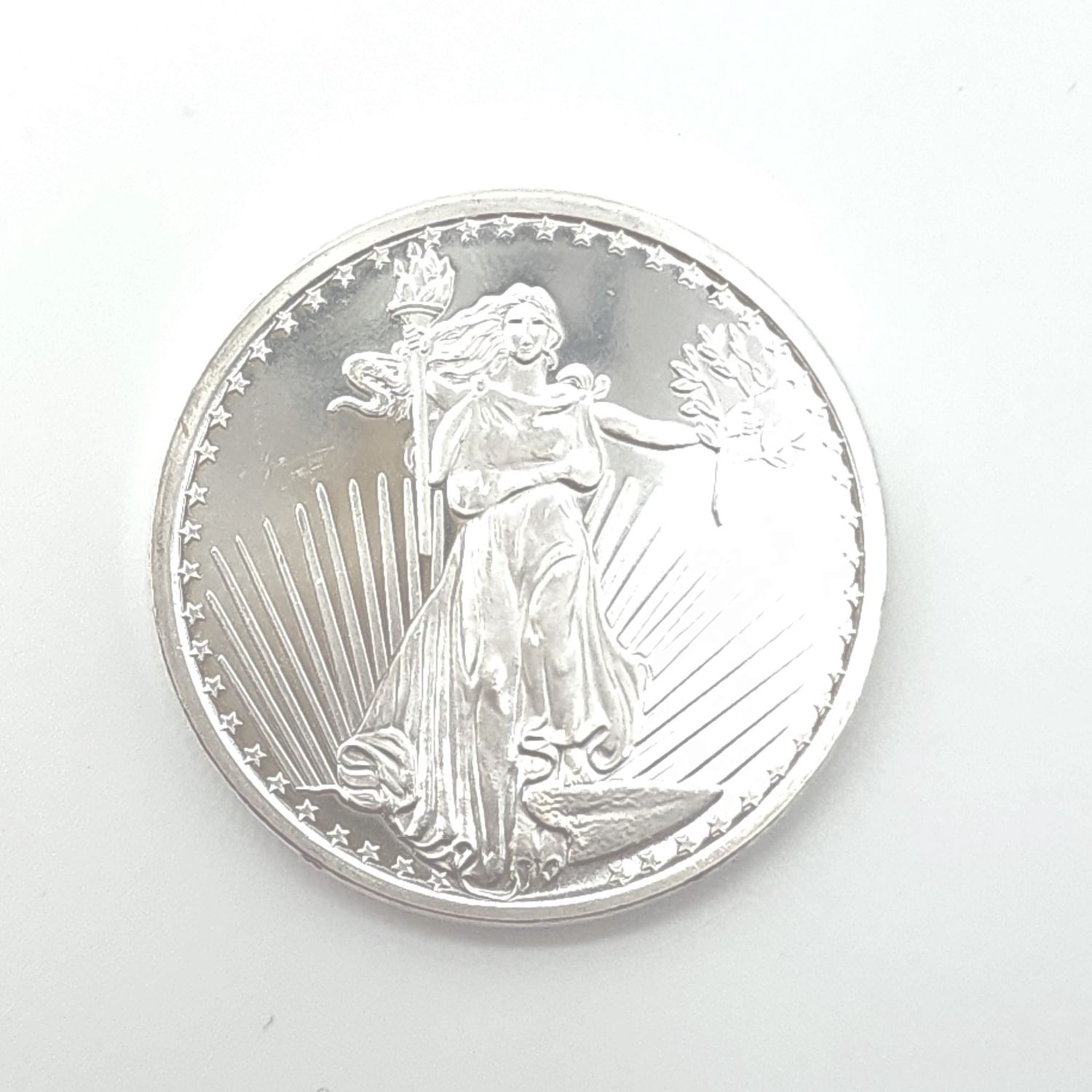 1oz St. Gaudens Silver Town Silver Round.