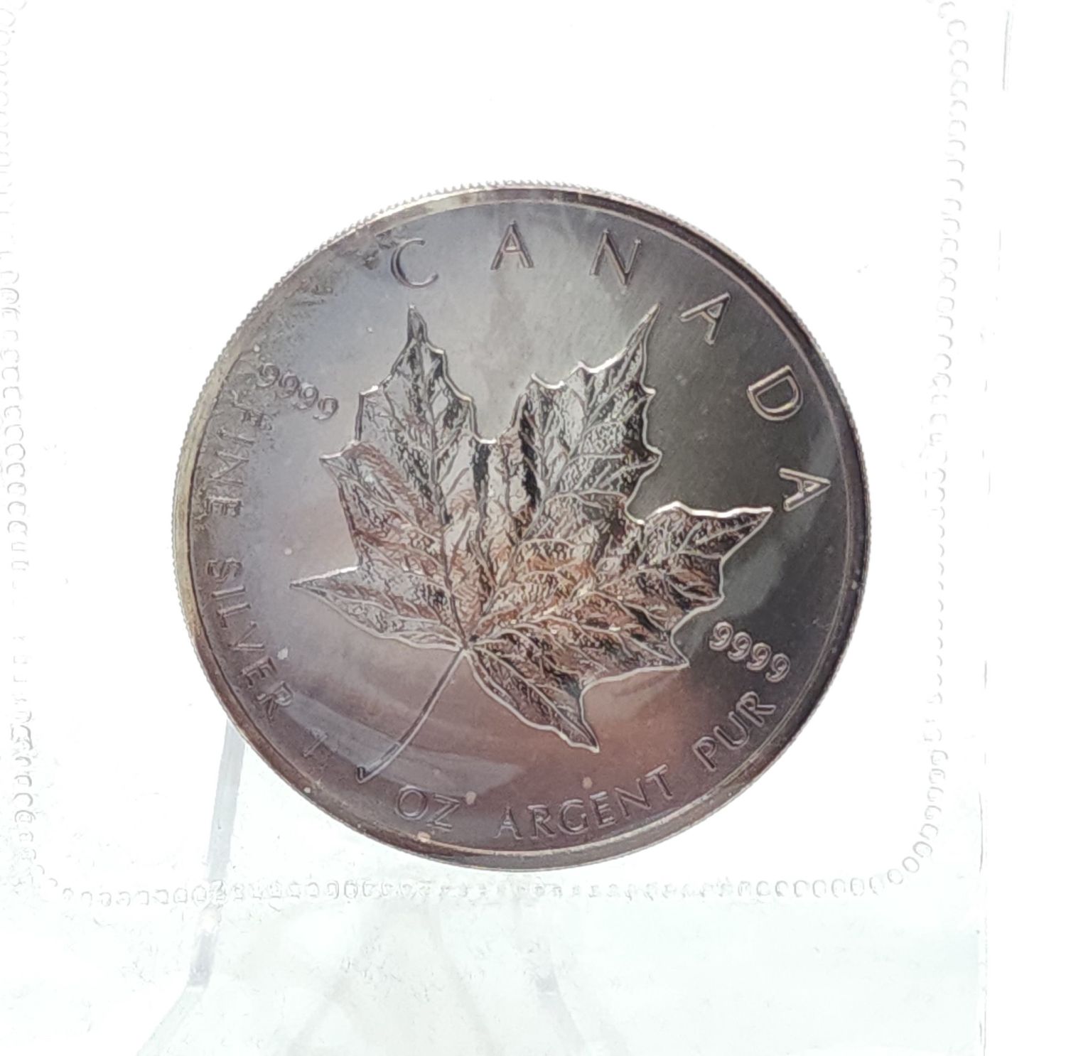 1990 Silver Canadian $5 Maple.