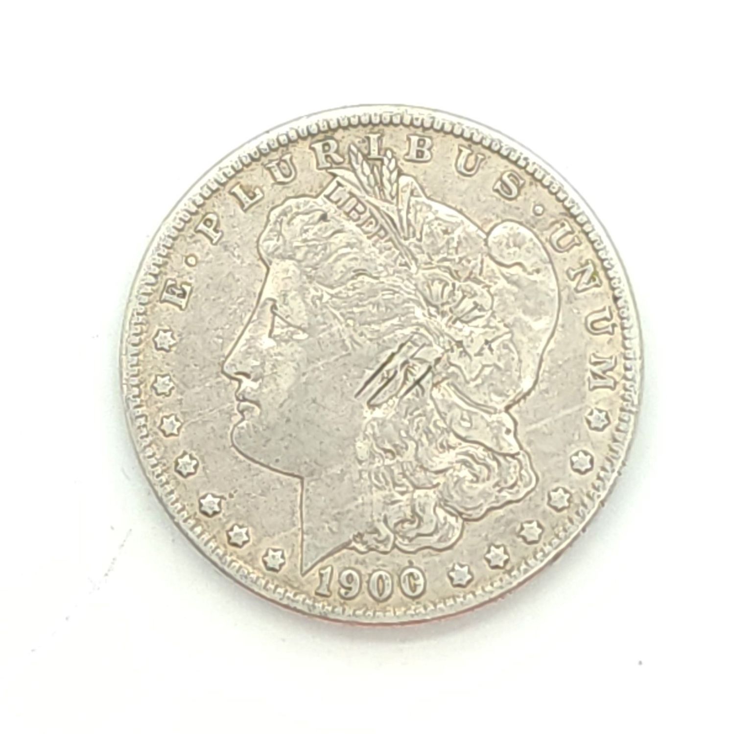 1900-O Morgan Silver Dollar.
