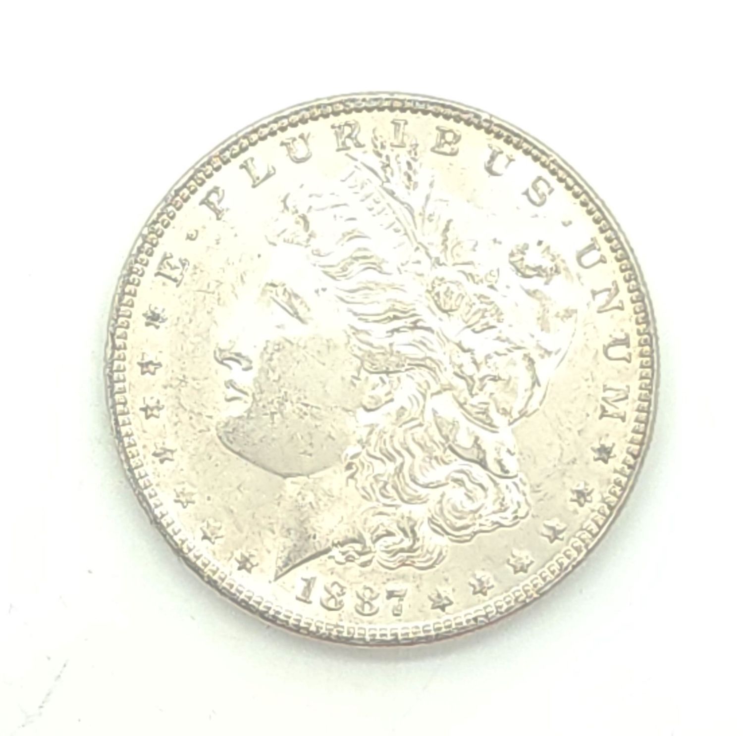 1887 Morgan Silver Dollar...