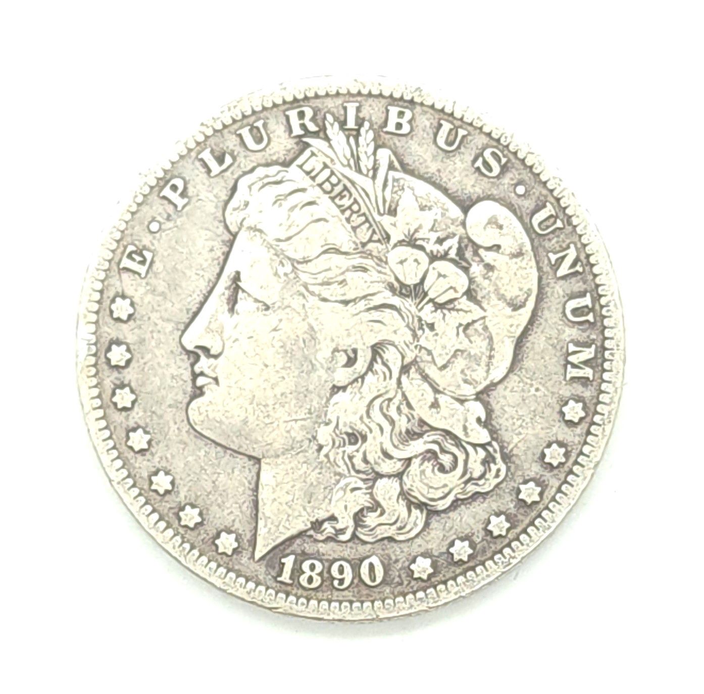 1890-O Morgan Silver Dollar.
