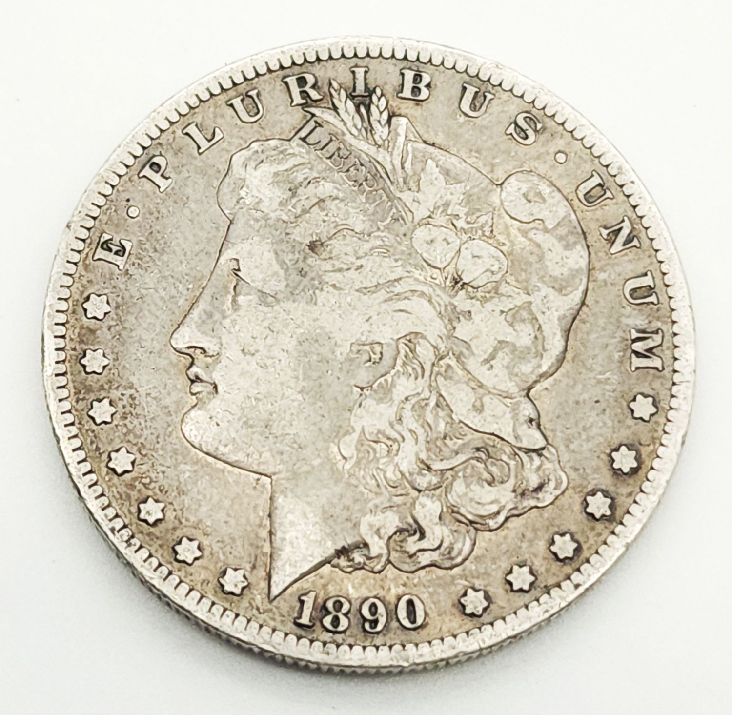 1890-O Morgan Silver Dollar .