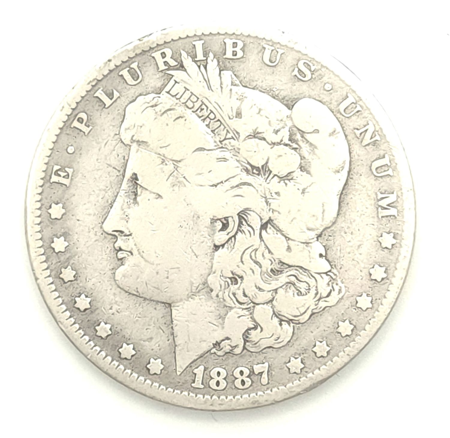 1887-0 Over 6 Morgan Silver Dollar