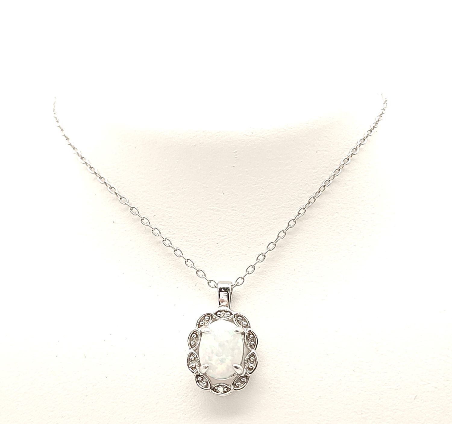 Sterling Silver Oval Halo Opal Pendant on Sterling Silver Chain Size: 18-20&quot;