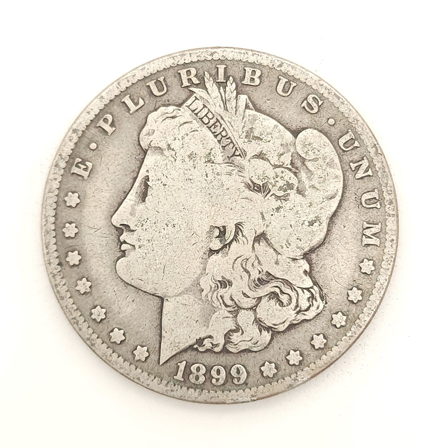 1899-O Morgan Silver Dollar.