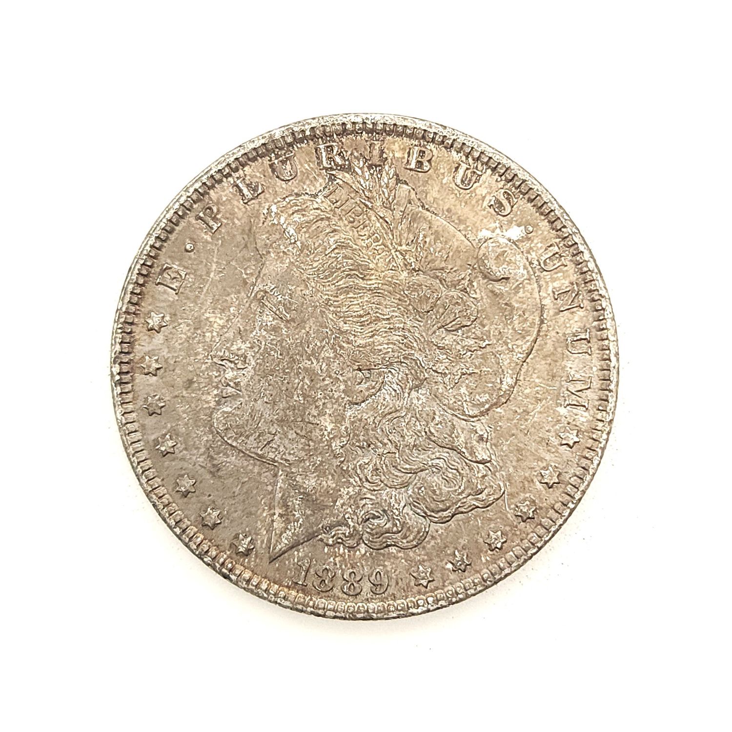1889 Morgan Silver Dollar ..