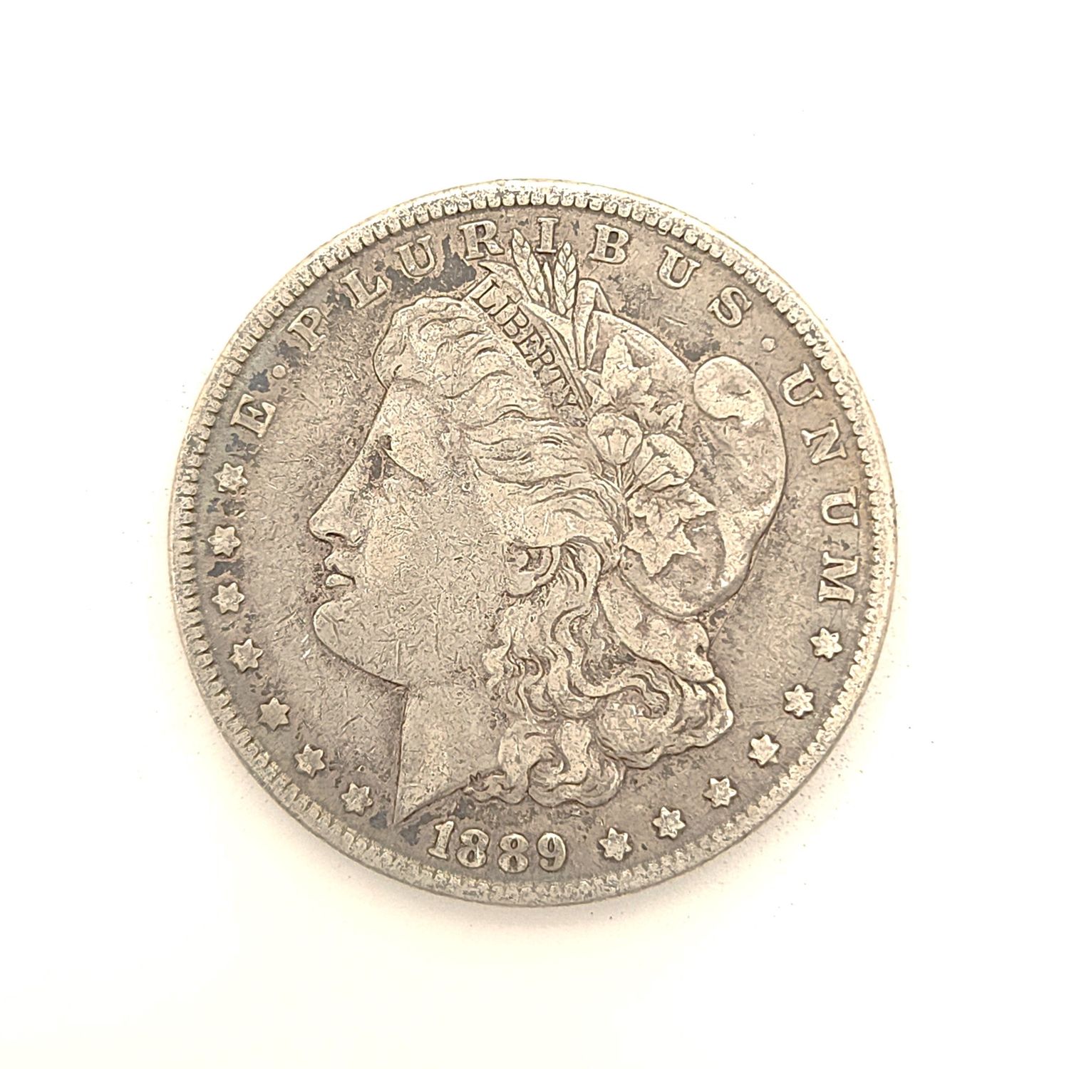 1889 Morgan Silver Dollar ....