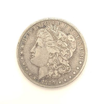 1889 Morgan Silver Dollar ....