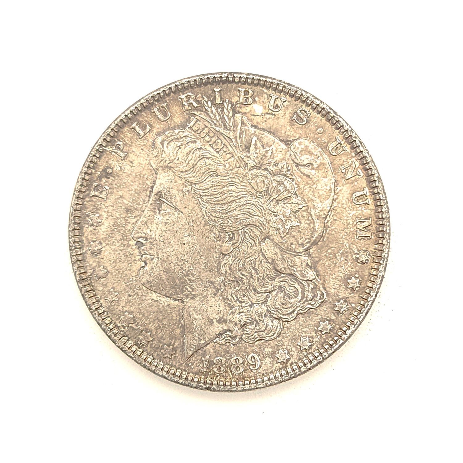 1889 Morgan Silver Dollar  .