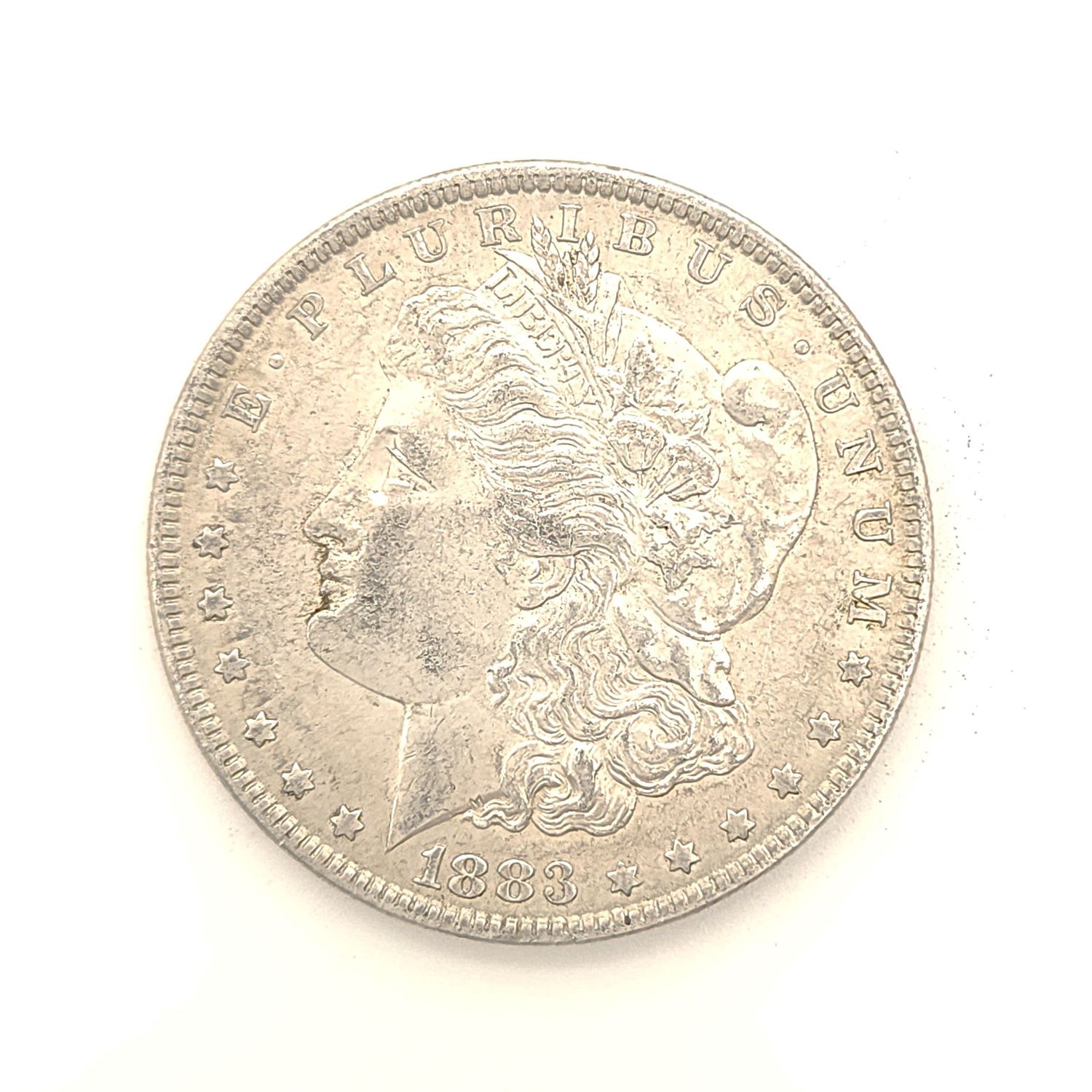 1883 Morgan Silver Dollar..
