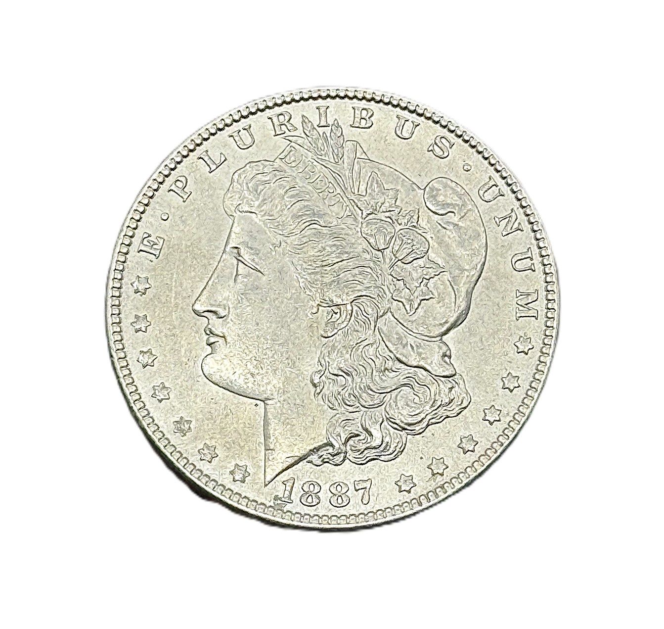 1887 Morgan Silver Dollar   .