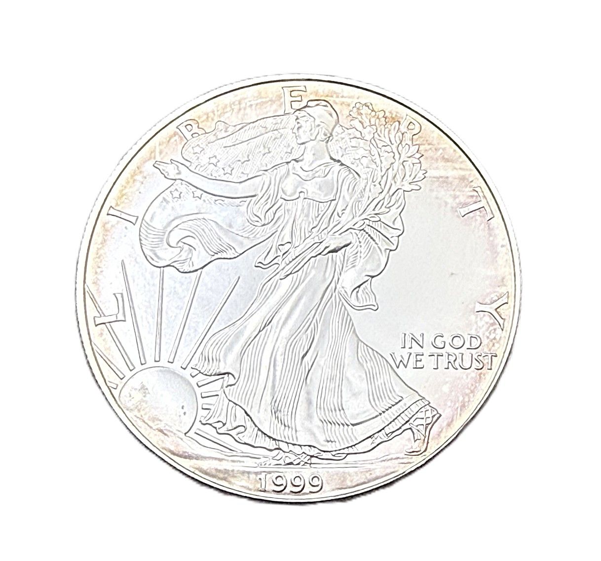 1999 1 oz American Silver Eagle Uncirculated with Light Rim Toning