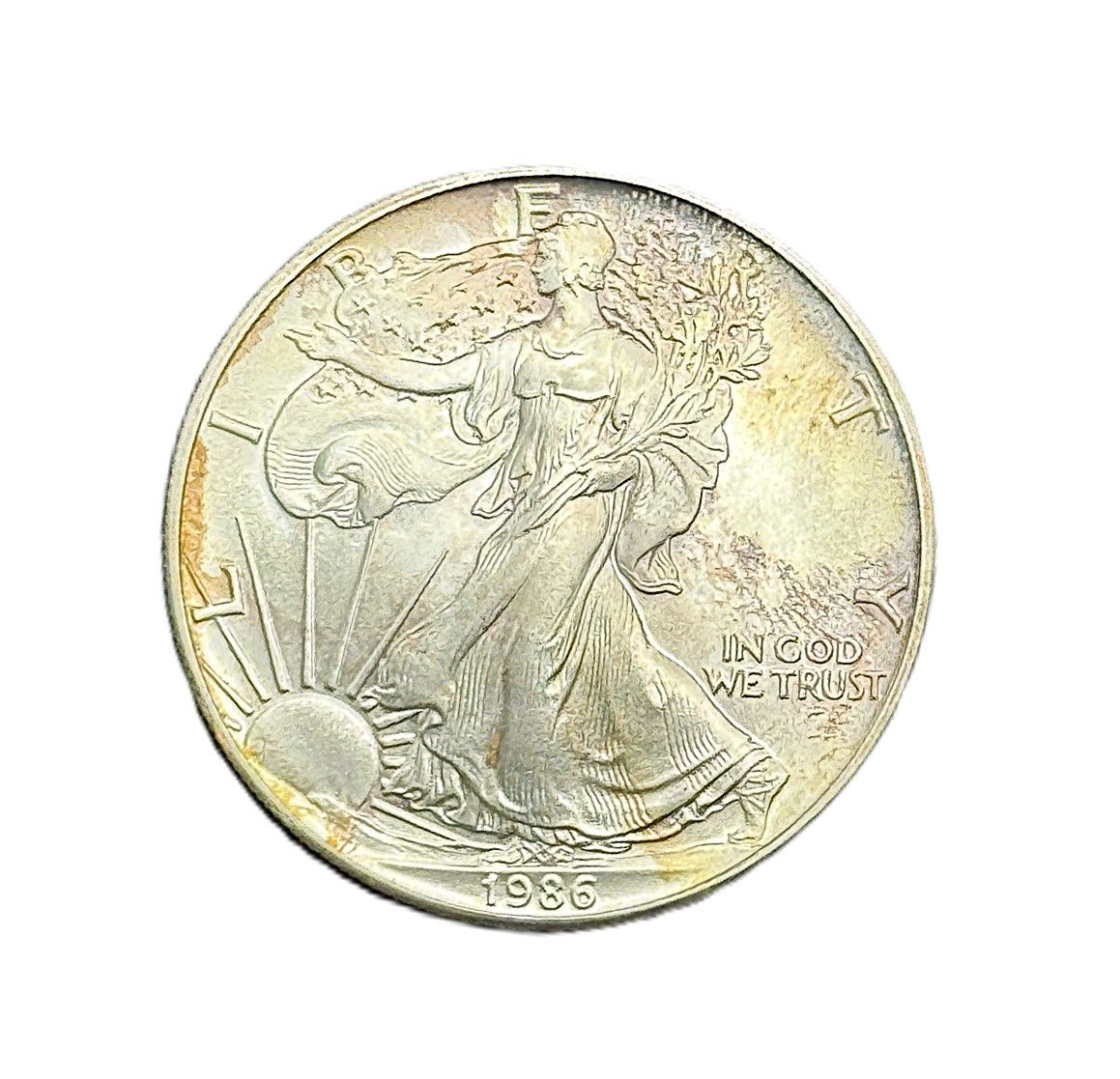 1986 American Silver Eagle 1 oz First Year Issue w/ Rainbow Toning