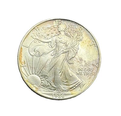 1986 American Silver Eagle 1 oz First Year Issue w/ Rainbow Toning