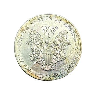 1986 American Silver Eagle 1 oz First Year Issue w/ Rainbow Toning